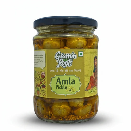 Homemade Amla Pickle in glass jar with mustard oil, crafted by rural artisans using traditional recipes