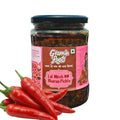 Lal Mirch Bharua Pickle in glass jar with fresh red chilies, handmade with mustard oil, no preservatives